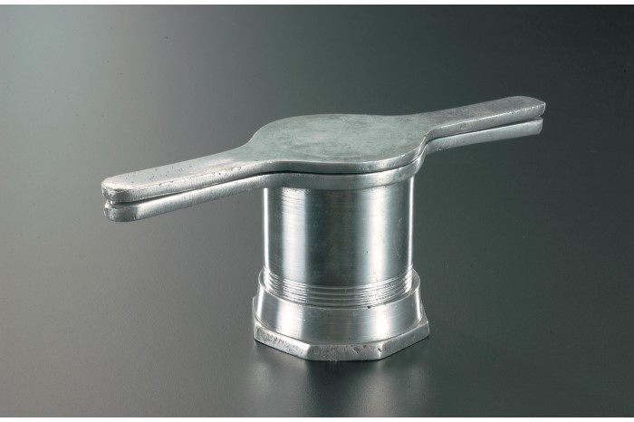 <strong><em>Murukku nazhi</em> (kitchen press for making <em>murukku</em>)</strong><br>
1991<br>
Stainless steel<br>
Collection of the National Museum of Singapore